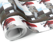 Giraffe die met Kerstmis een kerstcadeauPet draagt Cadeaupapier (Rol Hoek)