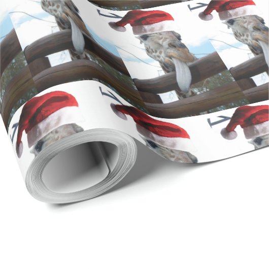 Giraffe die met Kerstmis een kerstcadeauPet draagt Cadeaupapier (Rol Hoek)