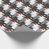 Giraffe die met Kerstmis een kerstcadeauPet draagt Cadeaupapier (Hoek)