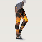 Giraffe drink water bij Cosmic Sunset Leggings (Rechts)