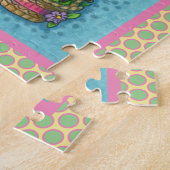 GIRAFFE IN SNELLE SPRINGEMAKERE BONNET, EGG BASKET LEGPUZZEL (Zijkant)