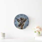 Giraffe kauwt ronde klok (Huis)