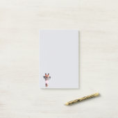 Giraffe met een bril die kauwgom blaast post-it® notes (Op bureau)