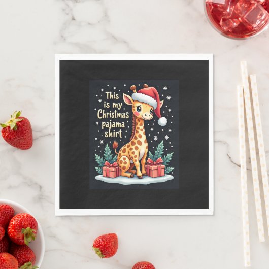 Giraffe met kerstmuts die overeenkomt met kerstpaj servet (Insitu)