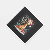 Giraffe met kerstmuts die overeenkomt met kerstpaj servet (Hoek)