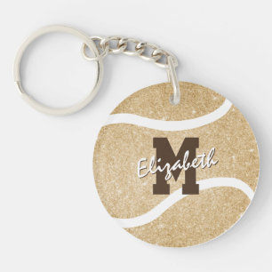 girale sportgoud monogrammen tenniszak label sleutelhanger