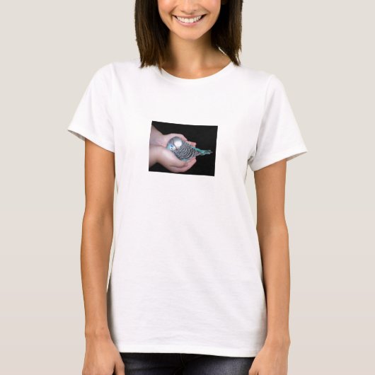 Girl holding baby budgie baby doll shirt (Voorkant)