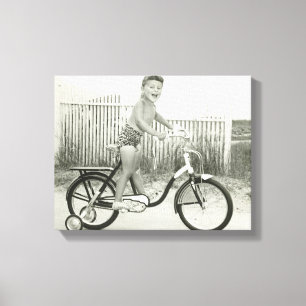 Girl Riding Bicycle Canvas Afdruk