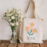 Girls Cute en Elegant Pink Flowers Tote Bag<br><div class="desc">Dit elegante en moderne florale ontwerp van de canvas tas kenmerkt schattige roze bloemen,  en biedt ruimte voor je om een meisjesnaam toe te voegen in een grillig lettertype. Een perfect cadeau voor bloemliefhebbende volwassenen of kinderen,  het perfecte cadeau voor bloemmeisje!</div>