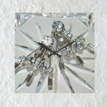 Glam  Art Deco Rhinestones Acrylisch Vierkante Klok<br><div class="desc">Het fotografische afbeelding van art deco strass oorbellen voegt de retro glamour toe aan deze elegante en glamoureuze acryl wandklok. De artdeco sieraden liggen op een achtergrond van gesneden kristal. De algehele look is een zilvergrijze die lijkt te schitteren met hints van ijzig bleek blauw. Het is opvallend en uniek...</div>