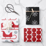 Glam Christmas Santa Sleigh Snowflake Dot Glitter Inpakpapier Vel<br><div class="desc">Deze trendy set van drie inpakpapieren vellen heeft unieke nep glitterpatronen die perfect zijn voor Kerstmis of voor elke feestelijke gelegenheid. Het eerste vel toont zilveren en rode retro Santa's slee silhouetten op een witte achtergrond. De tweede is voorzien van zilveren sneeuwvlokken op zwart, terwijl de derde beschikt over gedurfde,...</div>