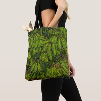 Glanzende bladeren in het zonlicht tote bag