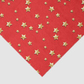 Glanzende gouden sterren op een rode achtergrond tissuepapier (Detail)