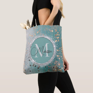 Glanzende gouden sterren op een turkooizen monogra tote bag