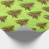 Glanzende kerstboom op abstract groen papier (Hoek)
