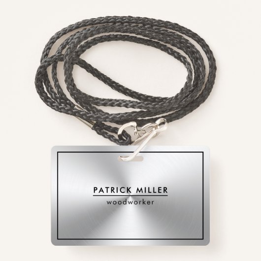 Glanzende metallic zilveren textuur zwarte accente badge (Voorkant met draagriem)