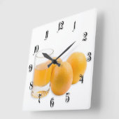 Glas van het sap en de drie sinaasappels vierkante klok (Hoek)