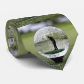 Glazen golfbal met golfspeler binnen, stropdas (Opgerold)