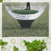 Glazen golfbal met golfspeler binnen, theedoek (Gevouwen)