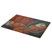 Glazen snoepautomaten en groene mandje snijplank (Hoek)