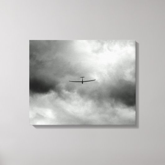 Glider vliegt in de grijze hemel canvas afdruk (Voorkant)