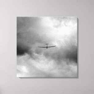 Glider vliegt in de grijze hemel canvas afdruk