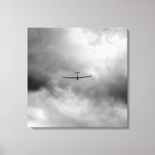 Glider vliegt in de grijze hemel canvas afdruk (Voorkant)