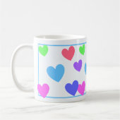 Gliding Hearts - Diverse pastelkleuren op blauw Koffiemok (Links)
