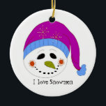 glimlachen Snowman Keramisch Ornament<br><div class="desc">Een schattige sneeuwman met een paars en blauw pet,  een grote grijs en een schattig gezegde accentueren dit ontwerp.</div>