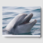 Glimlachende dolfijn in het water gastenboek (Achterkant)