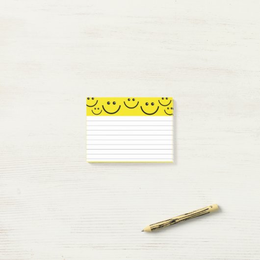 Glimlachende gezichten in Sunshine Yellow Post-it® Notes (Op bureau)