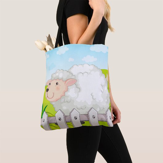 Glimlachende schapen in zonnig platteland tote bag
