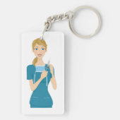 Glimlachende verpleegster met spuit sleutelhanger (achterkant)