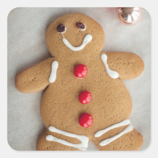 Glimlende gingerbroodman vierkante sticker (Voorkant)