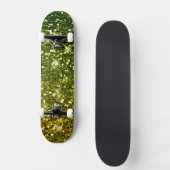 Glinsterende donkergroene gouden glitters skateboard (Voorkant)
