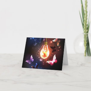 Gloeiende gloeilamp met nachtvlinders bedankkaart