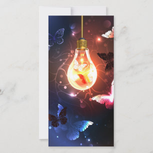 Gloeiende gloeilamp met nachtvlinders feestdagenkaart