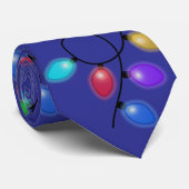 Gloeiende kerstverlichting op blauw stropdas (Opgerold)