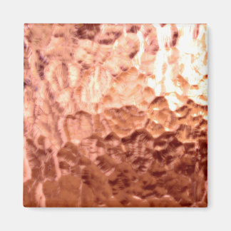 Gloeiende koperen sculptuur magneet