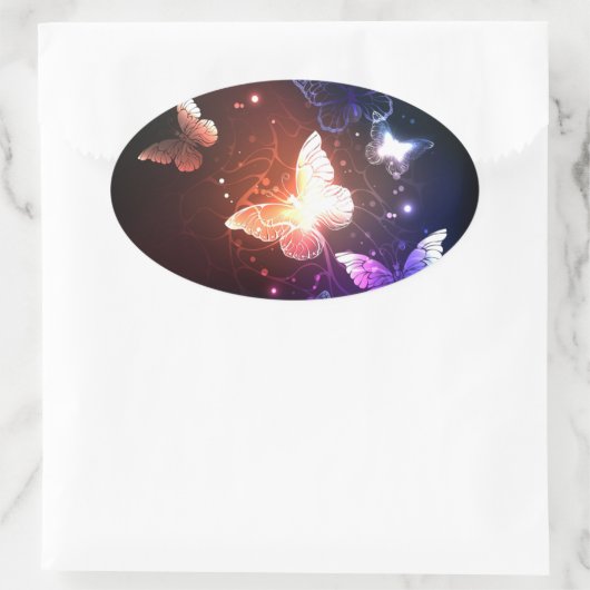 Gloeiende Nachtvlinders Ovale Sticker (Tas)