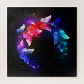 Gloeiende neon nachtvlinders op zwarte achtergrond legpuzzel (Horizontaal)