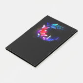 Gloeiende neon nachtvlinders op zwarte achtergrond post-it® notes (Schuin)