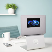 Gloeiende oneindigheid met blauwe roos sticker (Laptop op bureau)