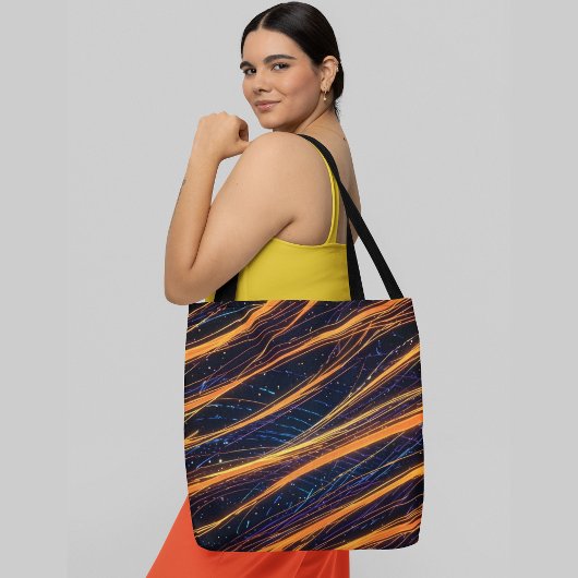 Gloeiende oranje en blauw abstracte lijnen met von tote bag