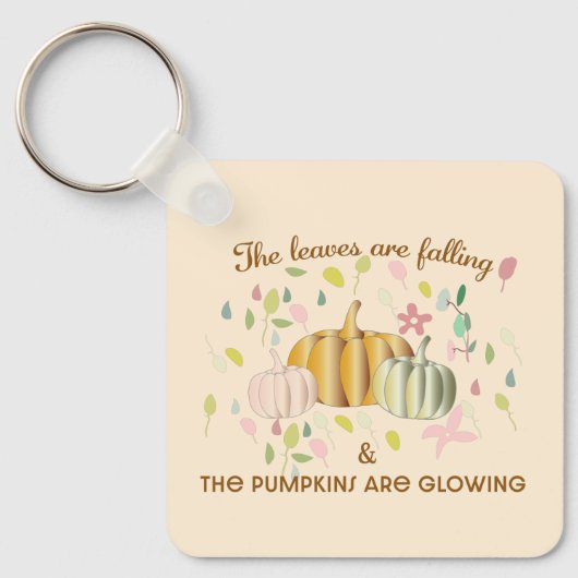 Gloeiende pompoen en herfst laat de vlakte van de  sleutelhanger (Voorkant)