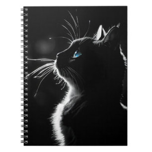 Gloeiende zwarte kat met blauw oog notitieboek