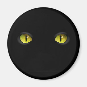 Gloeiende zwarte kat-ogen in het donker magneet