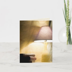 gloeilamp met een oude boekenimpressionisme kaart