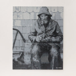 Gloucester-visser die zijn netten aan het reparere legpuzzel