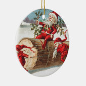 Gnomes dragging a cut tree trunk through the snow keramisch ornament (Rechts)